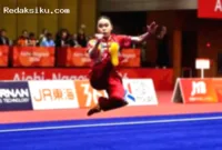 Eugenia Diva Widodo berpose dengan medali perunggu wushu di Asian Games 2026