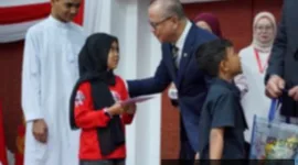 Menteri P2MI Jamin Pendidikan Anak Pekerja Migran di Malaysia