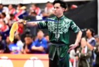 Atlet wushu Seraf Naro Siregar beraksi di arena pertandingan Asian Games 2026.