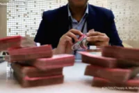 Rupiah Melemah — Grafik pergerakan nilai tukar rupiah yang melemah terhadap dolar AS di pasar spot