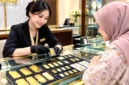 Harga emas batangan Pegadaian dan Antam ukuran 1 gram mengalami kenaikan di tengah dinamika pasar komoditas global.