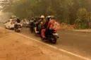 Kabut asap pekat menyelimuti wilayah Kalimantan Tengah akibat kebakaran hutan dan lahan yang berdampak pada kualitas udara.