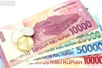 Rekening Rp50 Ribu — Ilustrasi kartu identitas dan buku tabungan bank untuk program rekening usia 17 tahun