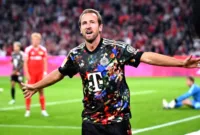 Harry Kane Pecahkan Rekor — Harry Kane merayakan gol dalam pertandingan Bundesliga bersama Bayern Munchen