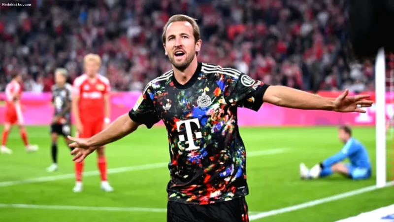 Harry Kane Pecahkan Rekor — Harry Kane merayakan gol dalam pertandingan Bundesliga bersama Bayern Munchen