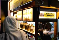 Dawa Minuman Rempah — Segelas minuman rempah tradisional Dawa dalam kemasan modern yang menyegarkan gaya hidup sehat.