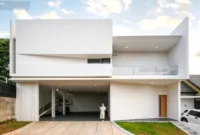 Rumah Japandi Putih Minimalis — Interior ruang tamu bergaya Japandi minimalis serba putih dengan aksen geometris yang estetik