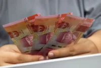 KPP BTN — Grafik dan aktivitas penyaluran Kredit Program Perumahan BTN senilai Rp7,4 triliun.